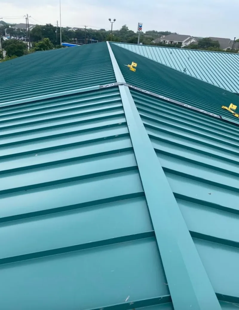 Green commercial metal roof ridge and valley for Metal Roof Repair in Wyandotte
