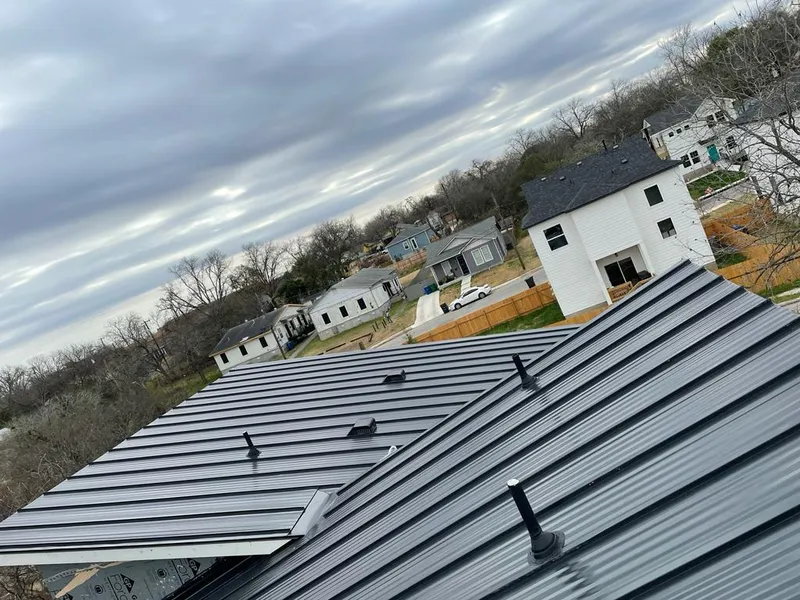 Standing seam metal roof panels with vents for Skylight Repair in Wyandotte